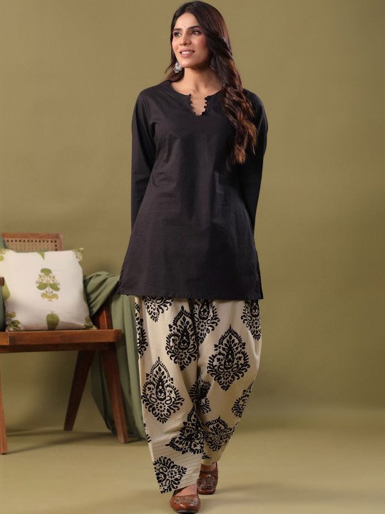 Red Printed Kurta with Patiala  Kurta design: Floral Printed Straight shape Regular style Mandarin Collar, three-quarter Regular Sleeves Na pockets Above Knee length with Curved hem Pure Cotton Machine Weave fabric  Patiala design: Solid Patiala Elasticated waistband  Size &amp;amp; Fit The model (height 5&amp;#039;8) is wearing a size S  Material &amp;amp; Care Hand Wash Seperately