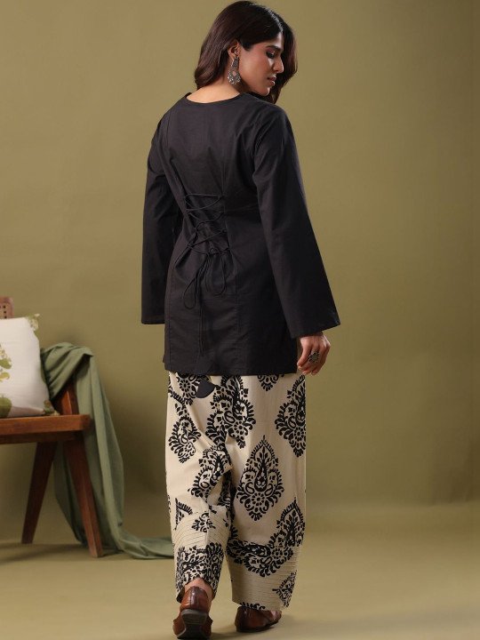 Red Printed Kurta with Patiala  Kurta design: Floral Printed Straight shape Regular style Mandarin Collar, three-quarter Regular Sleeves Na pockets Above Knee length with Curved hem Pure Cotton Machine Weave fabric  Patiala design: Solid Patiala Elasticated waistband  Size &amp;amp; Fit The model (height 5&amp;#039;8) is wearing a size S  Material &amp;amp; Care Hand Wash Seperately