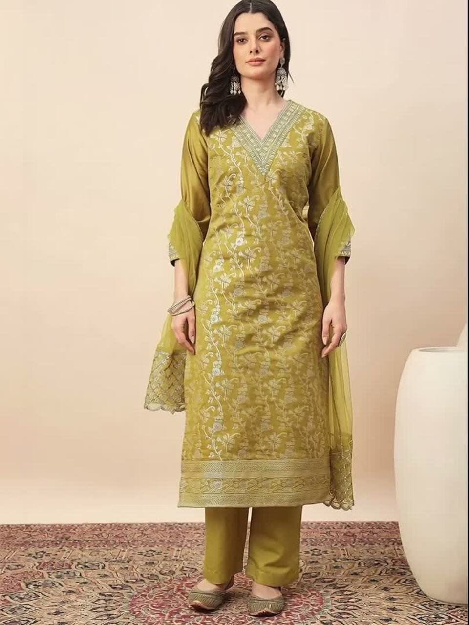 Pink and white embroidered kurta with trousers and dupatta  Kurta design: Ethnic motifs embroidered  Straight shape Regular style V-neck Three-quarter regular sleeves Thread work deteail Calf length with straight hem Silk blend machine weave fabric  Trousers design: Solid Trousers Elasticated waistband Zip closure Dupatta design: Embroidered dupatta  Taping border   Size &amp;amp; Fit The model (height 5&amp;#039;8&amp;quot;) is wearing a size M   Material &amp;amp; Care Kurta Fabric: Silk Blend Bottom Fabric: Silk Blend Dupatta Fabric: Organza Hand Wash