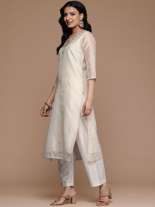 This kurta set consists of kurta trousers and dupatta Kurta Design Blue,white kurta Sequined Embroidered Straight shaped Regular style Round Neck Three quarter regular Sleeves Calf-length with straight hem with side slit Machine weave regular chanderi cotton Trousers Design: Solid trousers Partially elasticated Waistband Slip on closure Dupatta Design:  Solid dupatta Taping border  Size &amp;amp; Fit Regular fit The model (height 5&amp;#039;8&amp;quot;) is wearing a size S   Material &amp;amp; Care Top Material: Chanderi cotton Bottom Material: Silk crepe Dupatta Fabric: Net Dry clean only
