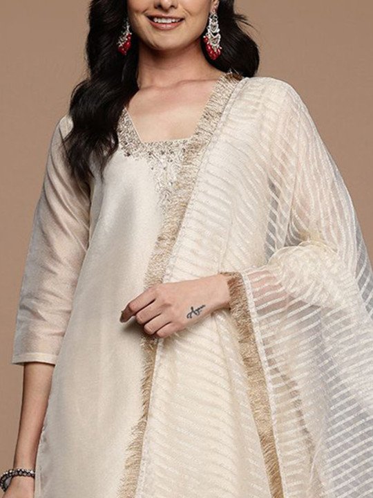 This kurta set consists of kurta trousers and dupatta Kurta Design Blue,white kurta Sequined Embroidered Straight shaped Regular style Round Neck Three quarter regular Sleeves Calf-length with straight hem with side slit Machine weave regular chanderi cotton Trousers Design: Solid trousers Partially elasticated Waistband Slip on closure Dupatta Design:  Solid dupatta Taping border  Size &amp;amp; Fit Regular fit The model (height 5&amp;#039;8&amp;quot;) is wearing a size S   Material &amp;amp; Care Top Material: Chanderi cotton Bottom Material: Silk crepe Dupatta Fabric: Net Dry clean only