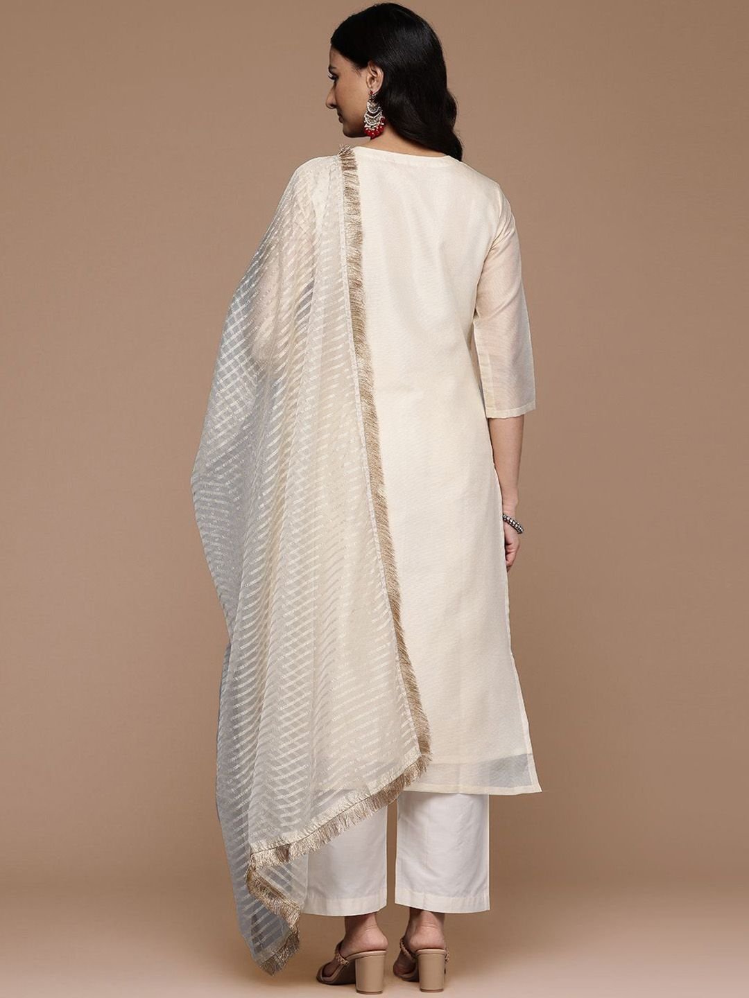 This kurta set consists of kurta trousers and dupatta Kurta Design Blue,white kurta Sequined Embroidered Straight shaped Regular style Round Neck Three quarter regular Sleeves Calf-length with straight hem with side slit Machine weave regular chanderi cotton Trousers Design: Solid trousers Partially elasticated Waistband Slip on closure Dupatta Design:  Solid dupatta Taping border  Size &amp;amp; Fit Regular fit The model (height 5&amp;#039;8&amp;quot;) is wearing a size S   Material &amp;amp; Care Top Material: Chanderi cotton Bottom Material: Silk crepe Dupatta Fabric: Net Dry clean only