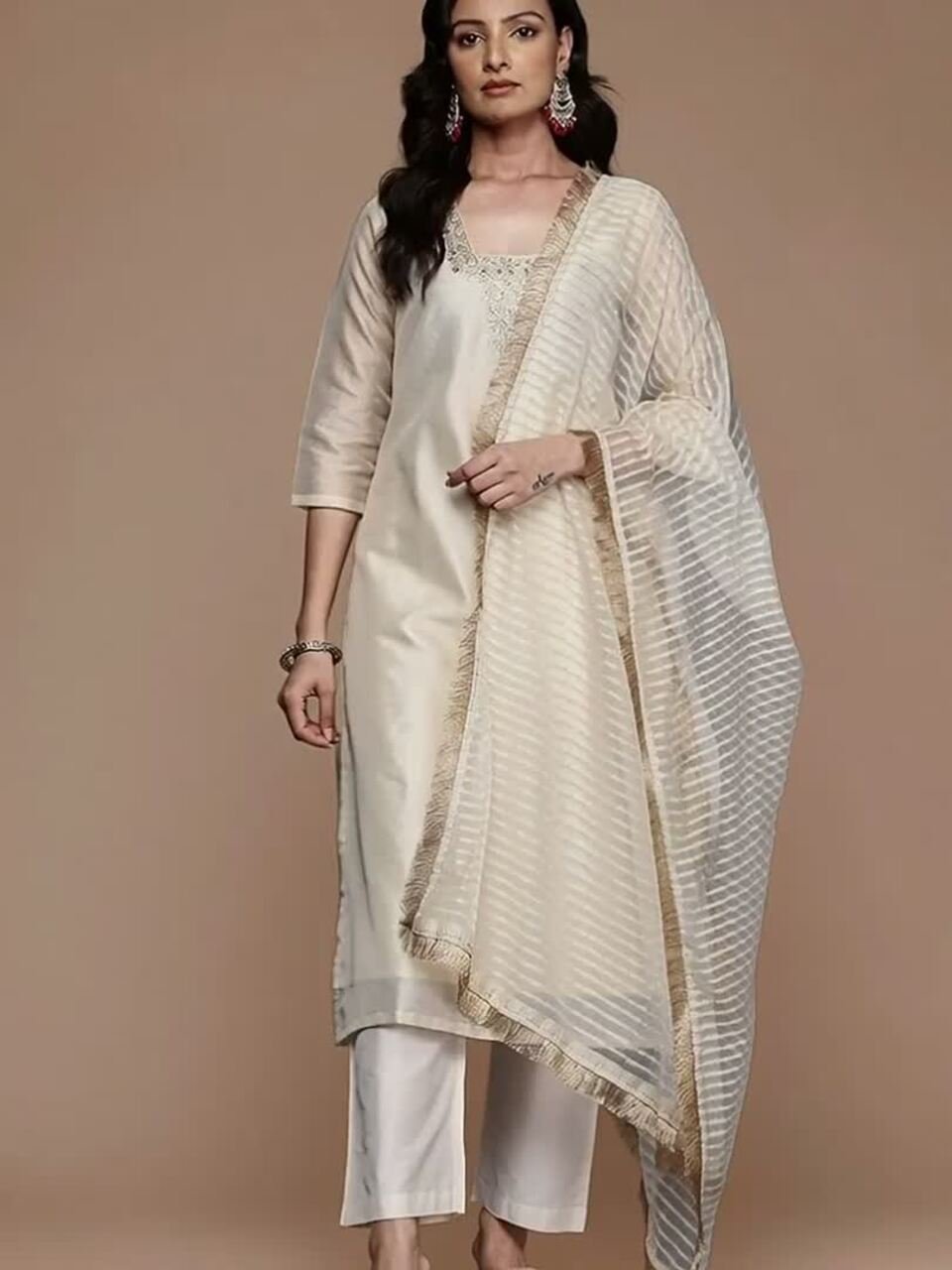 This kurta set consists of kurta trousers and dupatta Kurta Design Blue,white kurta Sequined Embroidered Straight shaped Regular style Round Neck Three quarter regular Sleeves Calf-length with straight hem with side slit Machine weave regular chanderi cotton Trousers Design: Solid trousers Partially elasticated Waistband Slip on closure Dupatta Design:  Solid dupatta Taping border  Size &amp;amp; Fit Regular fit The model (height 5&amp;#039;8&amp;quot;) is wearing a size S   Material &amp;amp; Care Top Material: Chanderi cotton Bottom Material: Silk crepe Dupatta Fabric: Net Dry clean only