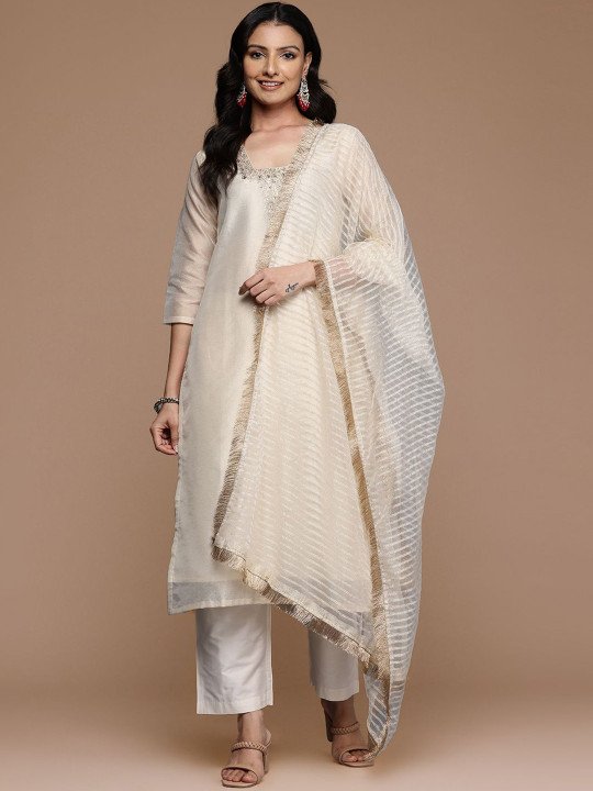 This kurta set consists of kurta trousers and dupatta Kurta Design Blue,white kurta Sequined Embroidered Straight shaped Regular style Round Neck Three quarter regular Sleeves Calf-length with straight hem with side slit Machine weave regular chanderi cotton Trousers Design: Solid trousers Partially elasticated Waistband Slip on closure Dupatta Design:  Solid dupatta Taping border  Size &amp;amp; Fit Regular fit The model (height 5&amp;#039;8&amp;quot;) is wearing a size S   Material &amp;amp; Care Top Material: Chanderi cotton Bottom Material: Silk crepe Dupatta Fabric: Net Dry clean only